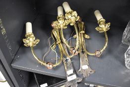 Two wall lights in the form of candlesticks, having art nouveau styling.