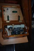 A 20th century surveyors theodolite by Stanley London 63420 with original wooden tripod stand