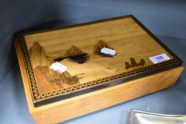 An early 20th century Tunbridge ware style jewellery box having inlaid coastal scene to front and