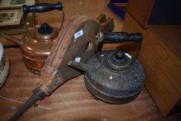 Two canal barge style copper kettles and a set of belows