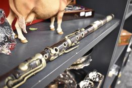 A late 19th or early 20th Century 5 piece rosewood flute, no makers mark, some damage but still