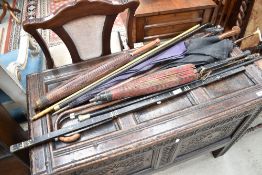 A selection of vintage sticks etc including yardsticks