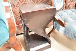 A modernist style wooden lamp base with carved twist