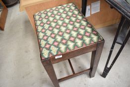 A 19th Century mahogany dressing table stool