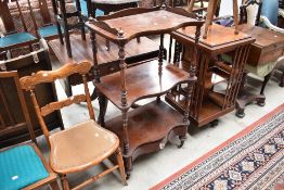 A Victorian mahogany etage having serpentine front, turned columns and drawer base with glass