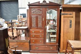 A Victorian mahogany mirror door wardrobe