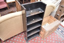 An early 20th Century oak narrow bookshelf, bamboo pattern