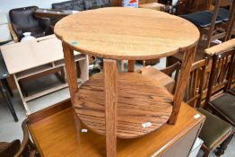 An Arts and Crafts style oak occasional/coffee table