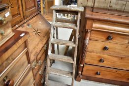 A traditional set of wooden step ladders