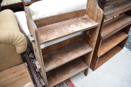 A late 19th or early 20th Century oak gothic style bookshelf, width approx. 60cm