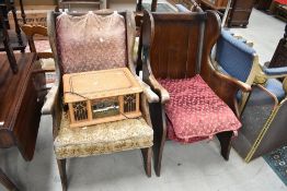 A pair of vintage oak lambing style easy chairs