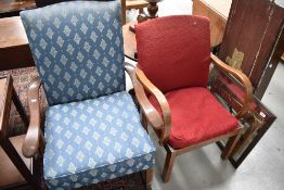 Two traditional stained frame armchairs