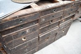 A merchants style parts chest base, having mixture of handles, some original campaign style ,