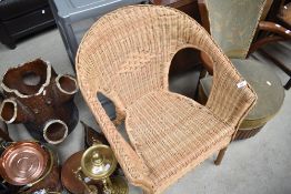 A canework conservatory chair