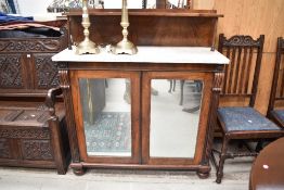 A Victorian mahogany chifonier having ledge back, marble top and mirror doors, width approx. 108cm