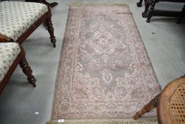 A modern hall way rug or similar carpet runner with grey ground