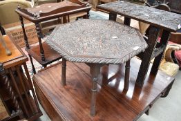 A period oak carved octagonal occasional table on turned legs