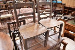 Two early 2oth century children's chairs, oak with ply seats.