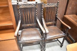 A pair of 1920's oak barley twist carver chairs, of Carolean influence