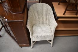 A vintage Lloyd Loom tub chair