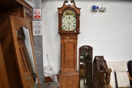 A 19th Century oak cased long case clock having 8 day movement , painted dial, name indistinct
