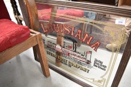 A pub style mirror, branding for Louisiana steamboat company