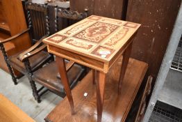A 1920's oak drop leaf table with moulded top and leaves over barley twist supports.