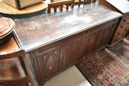 A period oak four panel kist, diamond patter to panels, width approx. 144cm