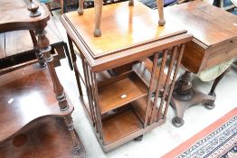 An Edwardian mahogany revolving bookcase