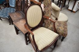 A 19th Century mahogany armchair having shield back