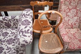 Two Victorian mahogany bedroom chairs, one padded the other cane-seated.