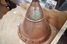 A vintage copper headed posser, with applied brass label 'Eclipse Leeds'