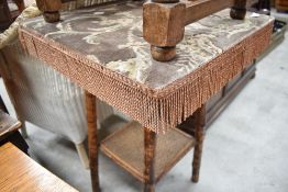 A Victorian bamboo occasional table, the square top with applied carpet and tasselled fringe