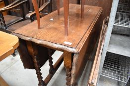 A reproduction Italian musical work table with profuse inlaid decoration to the hinged top, raised
