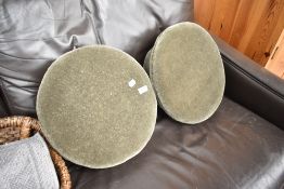 A pair of mushroom style footstools having bun feet and dralon upholstery