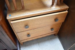 A early 20th Century golden oak low bedroom chest