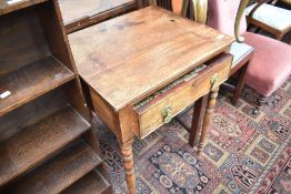A Victorian side table having frieze drawer, on turned legs, width 53cm