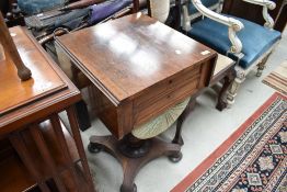 A 19th Century sewing table having pull out cloth section and two additional drawers, on William