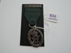 A Volunteer Officers’ Decoration, V.R. cypher, hallmarks seen, reverse engraved ‘Surgeon-Major