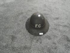 A WW2 Black Fire Guard Helmet, FG on front and back, marked inside 281M SNA 9/41, marked leather