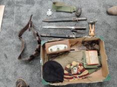 A Military collection including Bayonets, Webbing, Shirt, Gaytors, Badges, Radio, Hand Grenade,