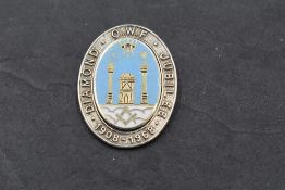 An Order of Women Freemasons Diamond Jubilee HM silver and enamel jewel
