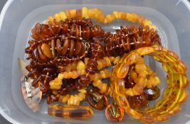A selection of Baltic amber jewellery including necklaces, brooches, bracelet and clip earrings