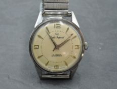 A gent's Smiths Imperial manual wrist watch having baton and Arabic numeral dial to champagne face