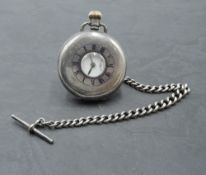 An HM silver half hunter top wound pocket watch by Pinnacle having Roman numeral dial with