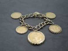 A 9ct gold fancy link bracelet with padlock clasp having two gold sovereigns in detachable mounts,