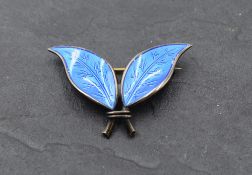 A Norwegian silver leaf brooch having blue enamel decoration, bearing marks for David Anderson