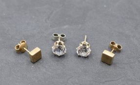 Two pairs of yellow metal and 9ct gold stud earrings