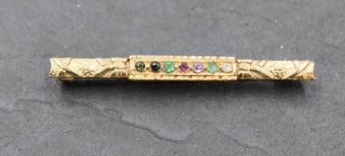 A 9ct gold multi gem 'DEAREST' bar brooch, approx 2.5g