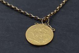 A Victorian gold sovereign dated 1887 with attached pendant loop yellow metal belcher chain